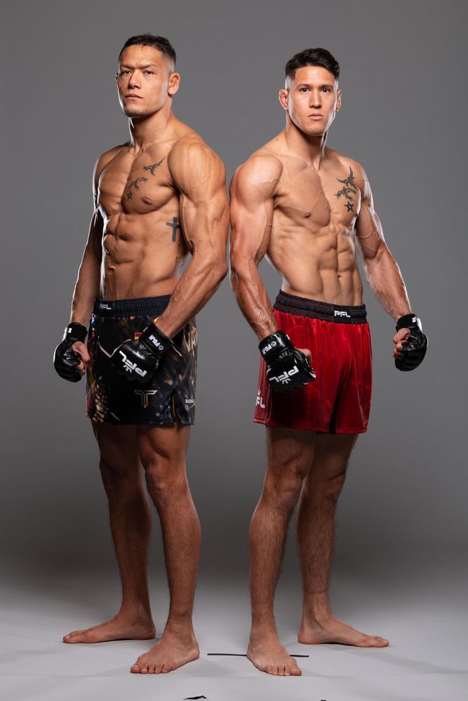 Costello and a teammate in a studio shoot