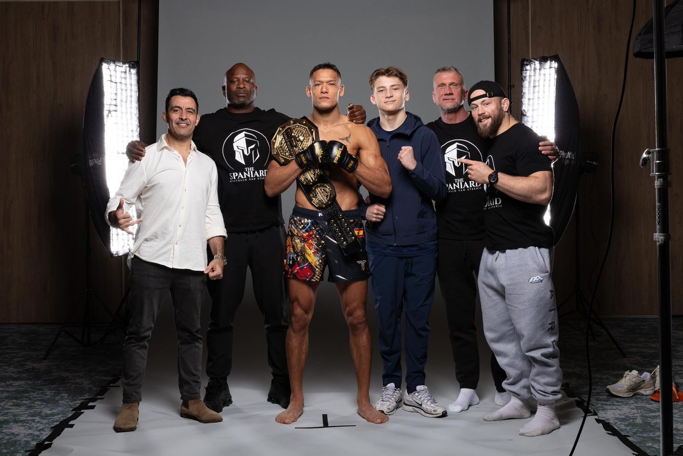 Costello with his team and the belt